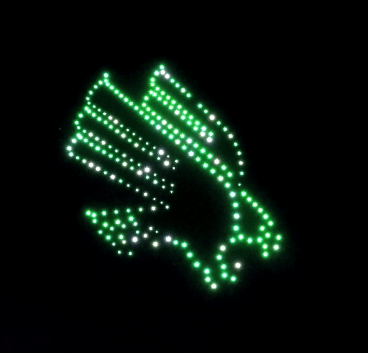 Green LED lights forming abstract wing shape